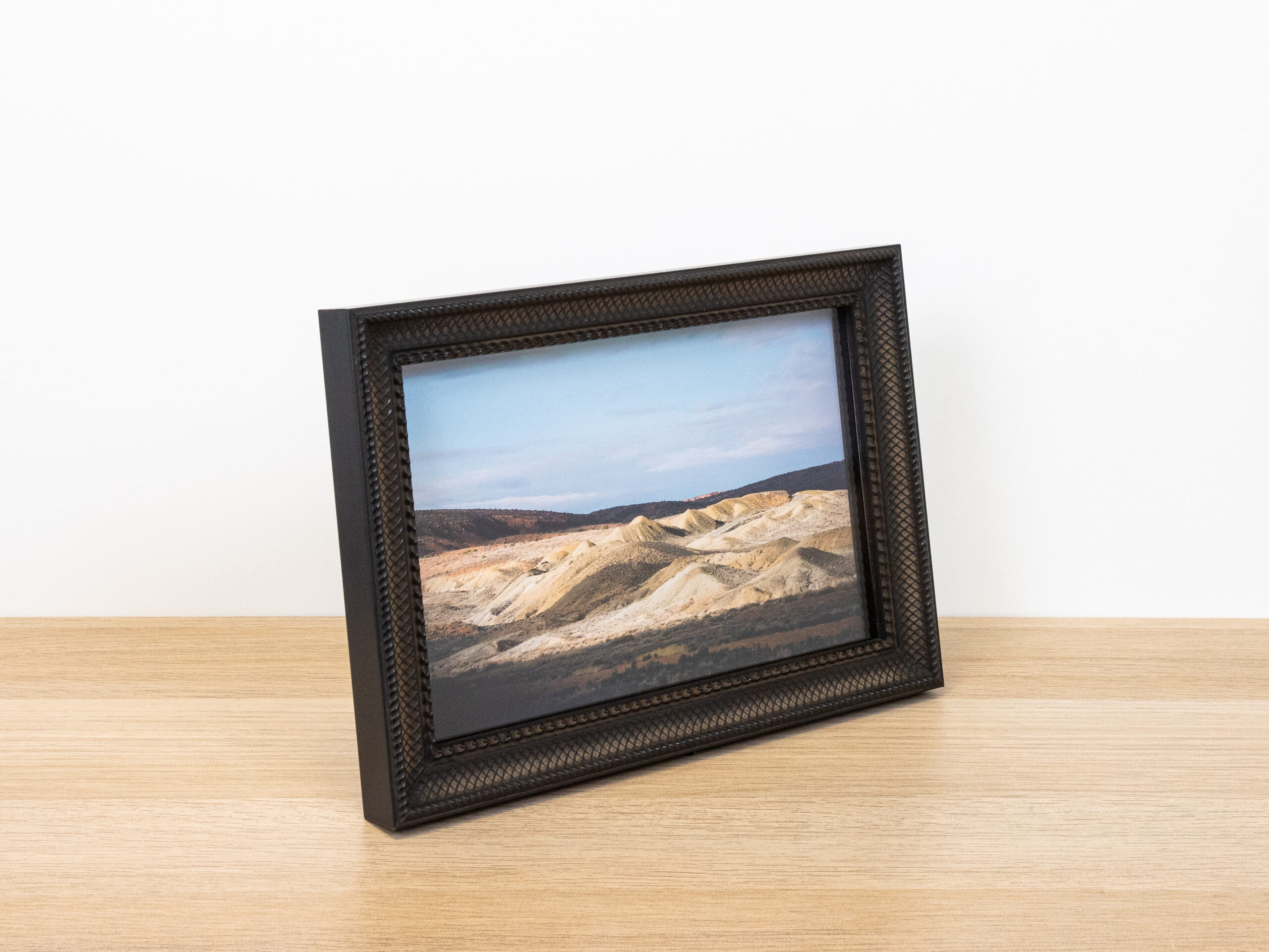 Framed photograph of desert landscape